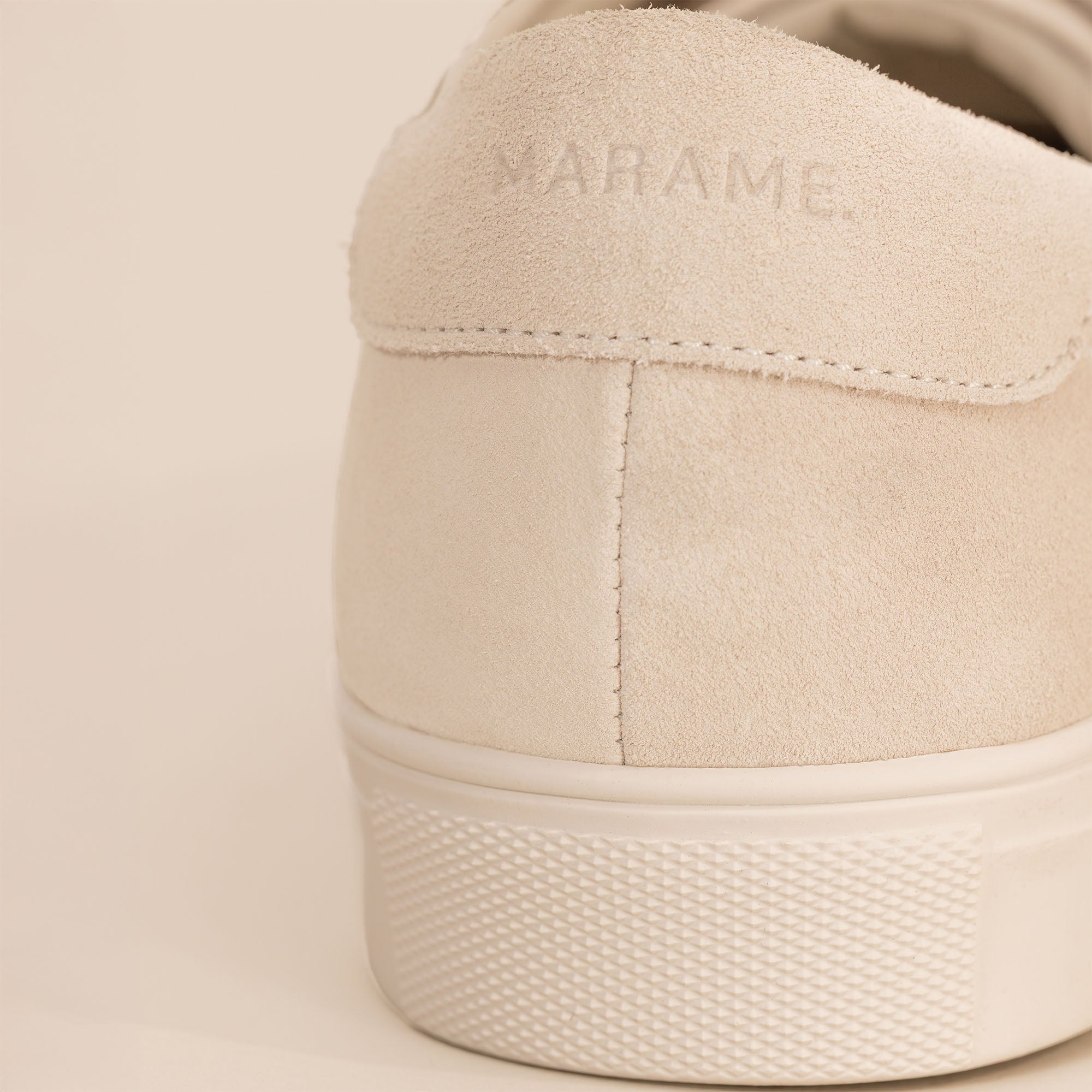 Marame Smart Suede Trainers in Grey, closeup.