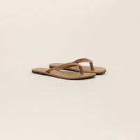 Marame Leather Flip Flops in Brown, front view.