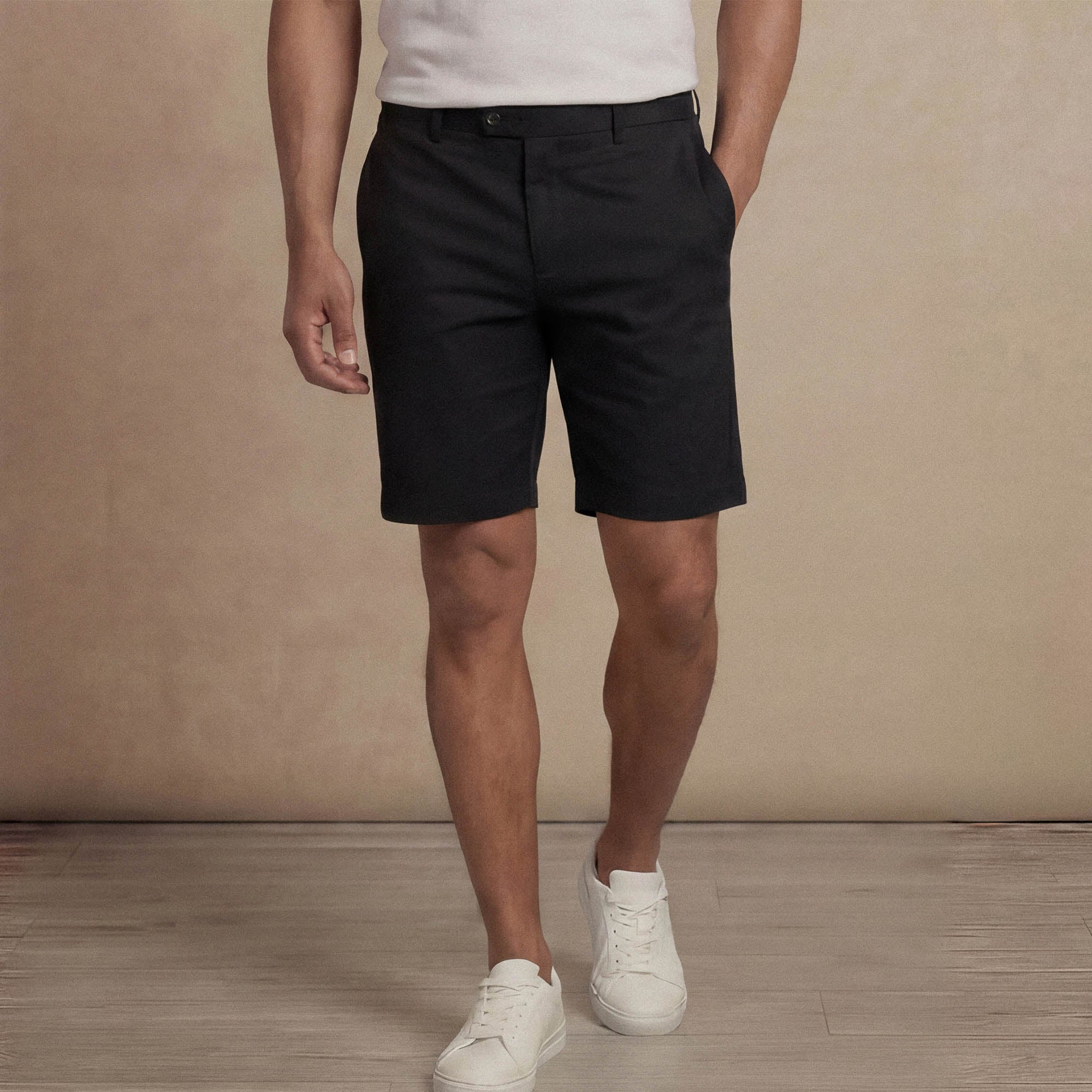 Man wearing Marame Chino Shorts in Black, front view. |black