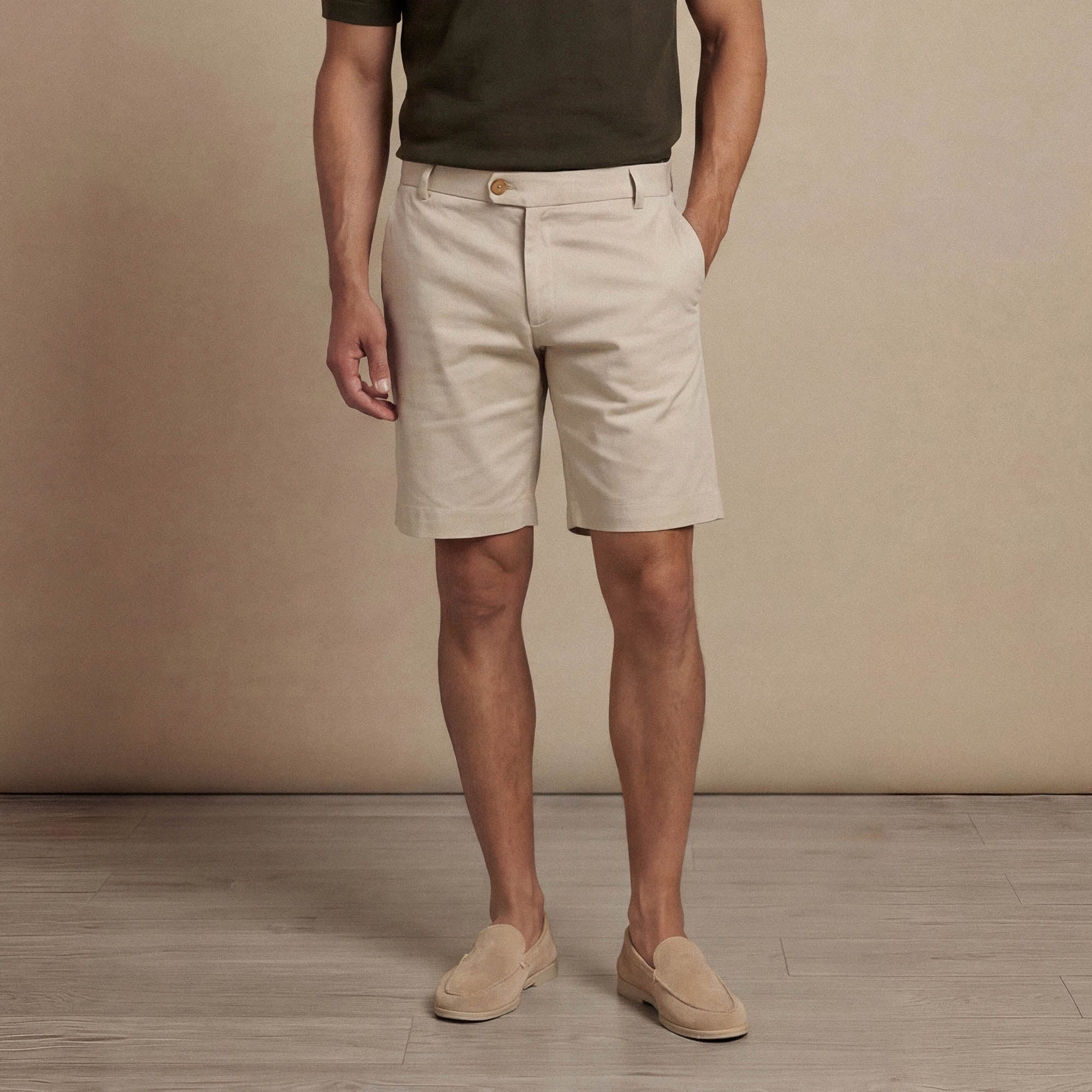 Man wearing Marame Chino Shorts in almond taupe front view. |almond taupe