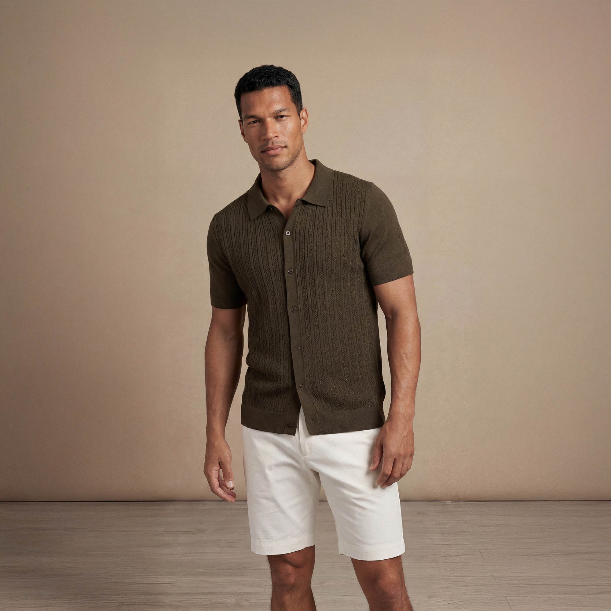 Man wearing morning meadow cable knit short sleeve shirt, front view. |morning meadow