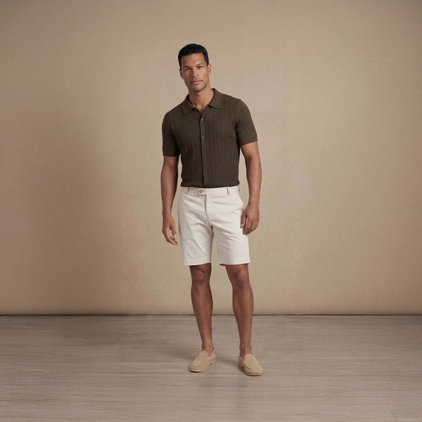 Man wearing morning meadow cable knit short sleeve shirt, full view. |morning meadow