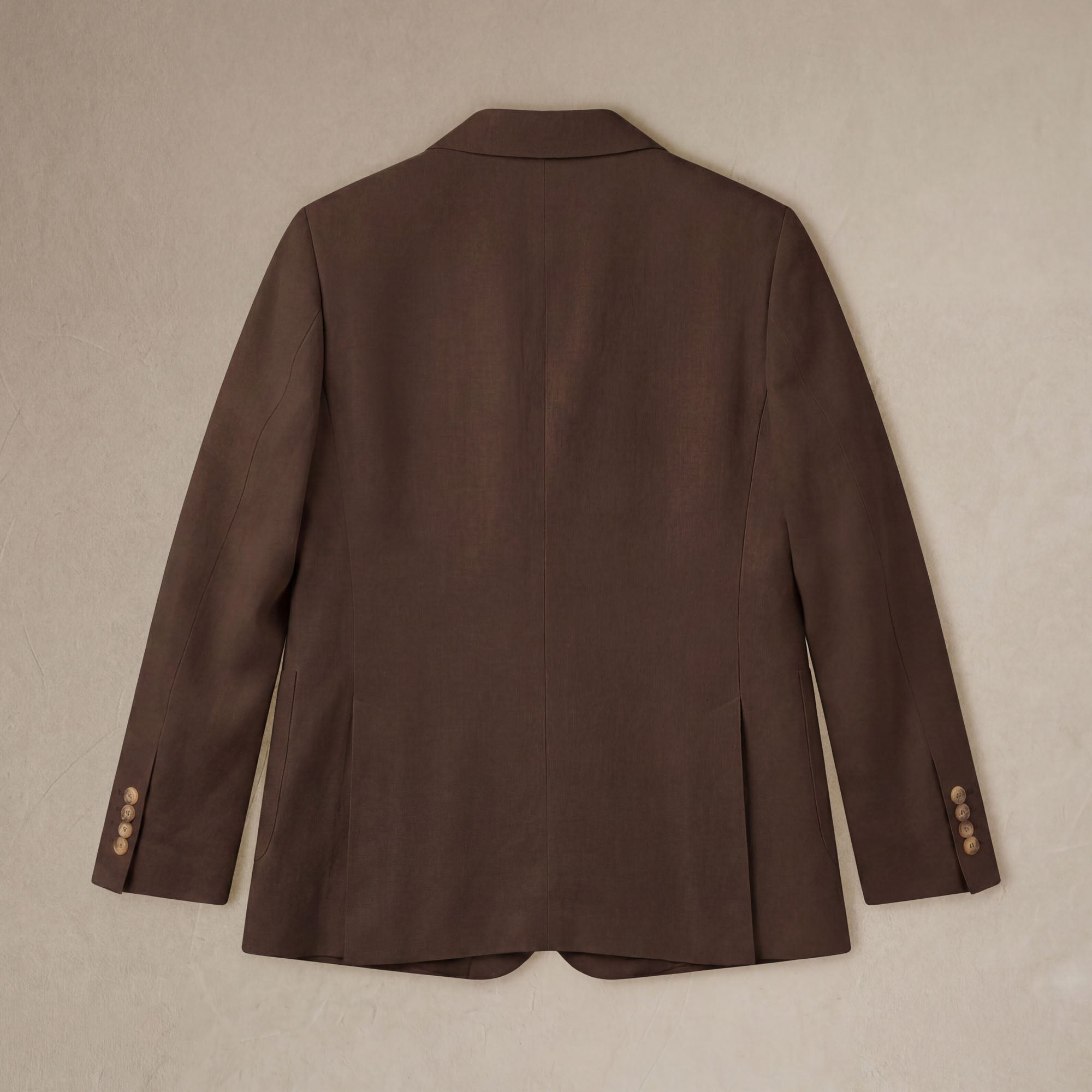 flat lay back |brown linen