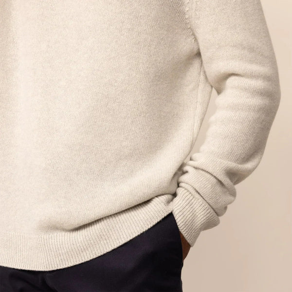 Man wearing a Marame Merino Wool Crew Neck Knit Jumper in Speckled Grey, closeup.|speckled grey