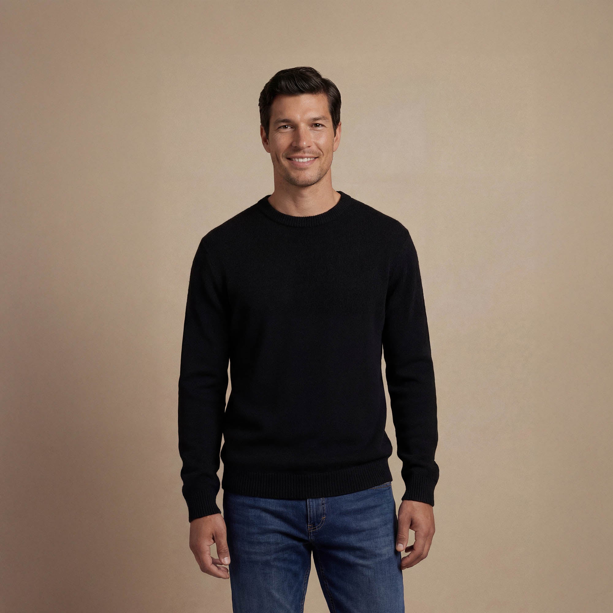 Man wearing a Marame Merino Wool Crew Neck Knit Jumper in front view.|black