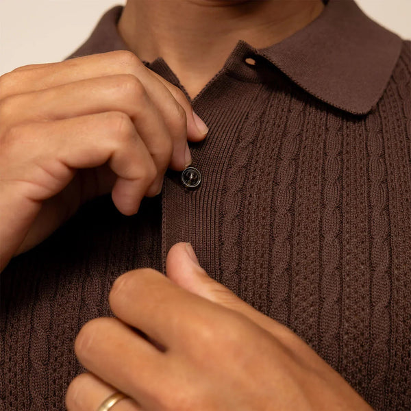 Man wearing cable knit shirt in conker brown, closeup. |conker brown