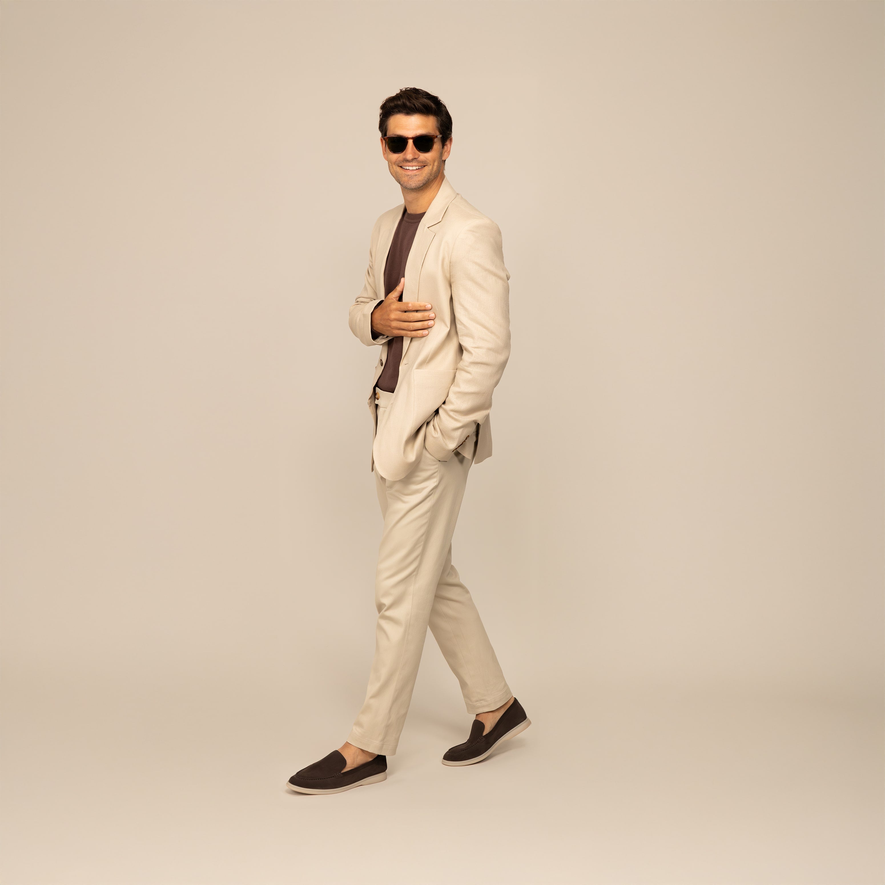 Man wearing a Marame Casual Blazer in Beige, front view.