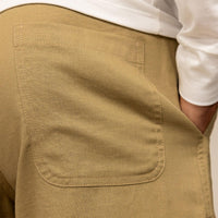 Man wearing Casual Linen Blend Shorts in Barley Green, closeup. |barley green