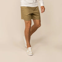 Man wearing Marame Casual Linen Blend Shorts in Barley Green, front view. |barley green