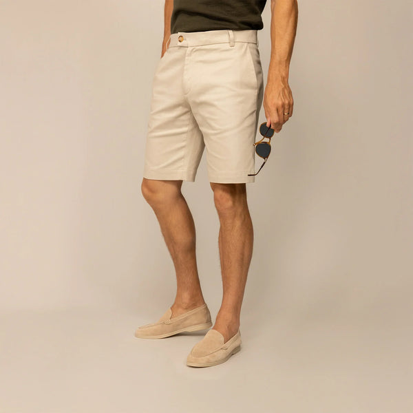 Man wearing Chino Shorts in Almond Taupe, front view.