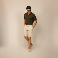 Man wearing Chino Shorts in Almond Taupe, front view.