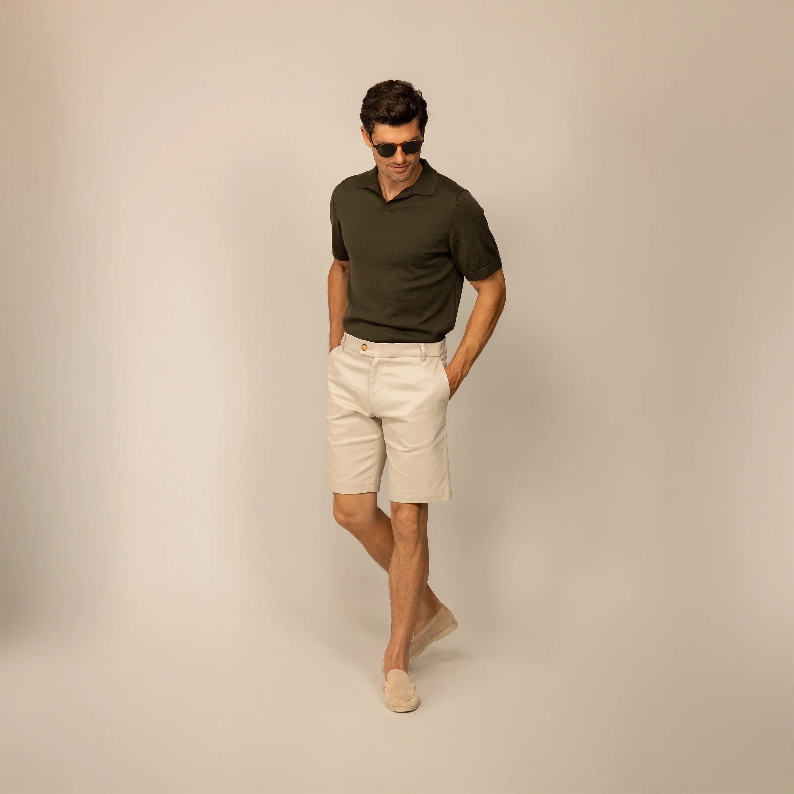 Man wearing Chino Shorts in Almond Taupe, front view. |almond taupe