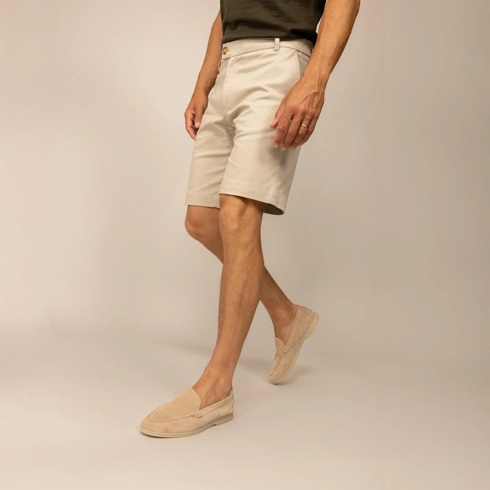 Man wearing Chino Shorts in Almond Taupe, front view.
