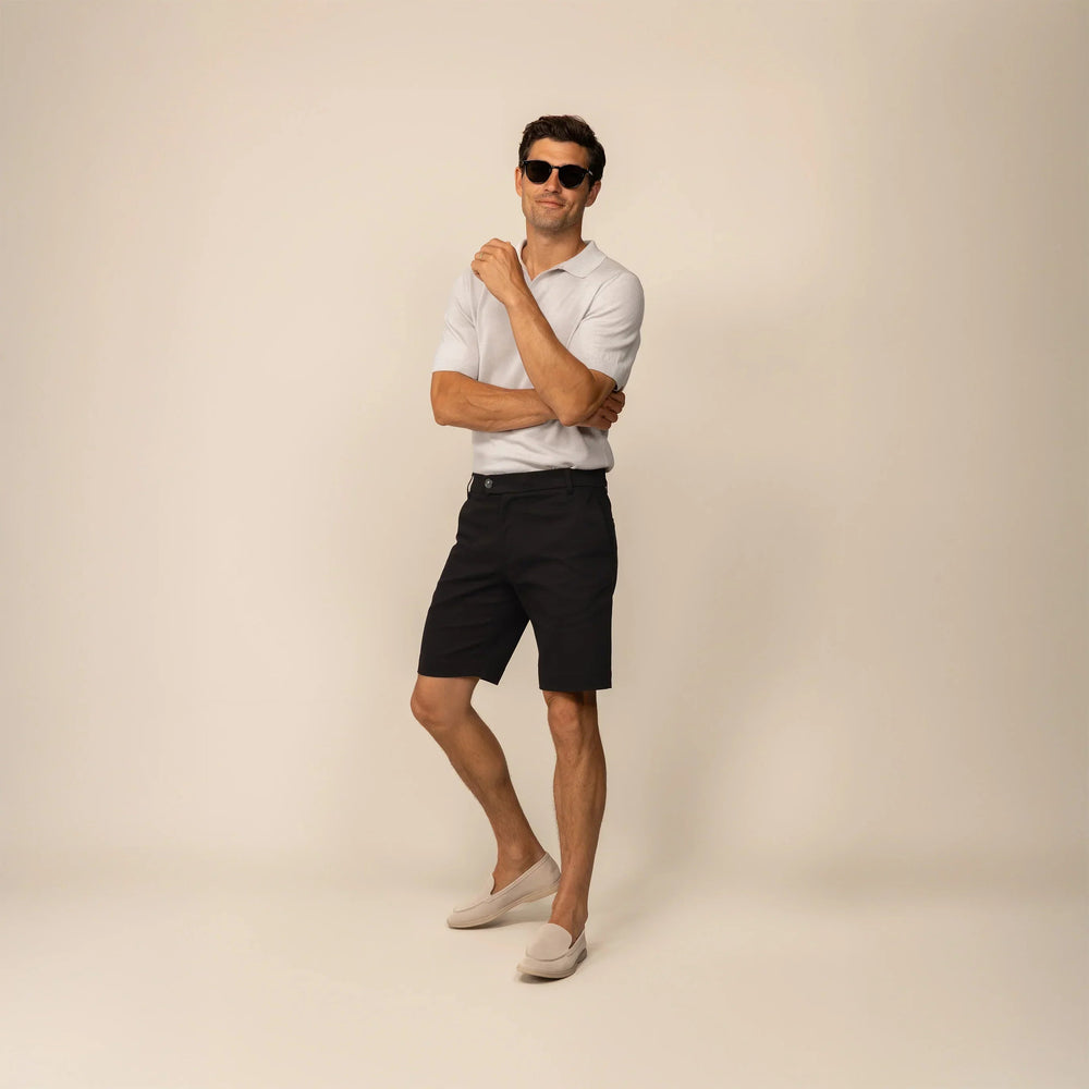 Man wearing Chino Shorts in Black, front view. |black