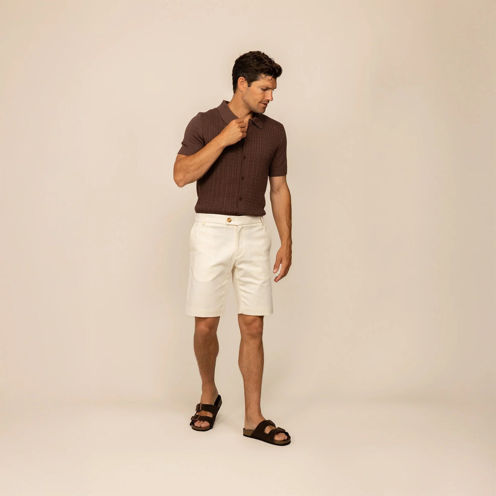 Man wearing Chino Shorts in Ivory Stone, front view.