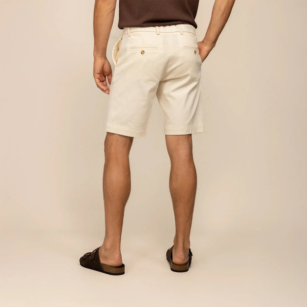 Man wearing Chino Shorts in Ivory Stone, rear view. |ivory stone