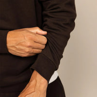 Man wearing a Marame cotton fleece hoodie in Smoked Brown, closeup.|smoked brown