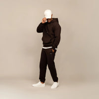Man wearing Marame Cotton Fleece Joggers in Smoked Brown, full view.|smoked brown