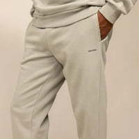 Man wearing Cotton Fleece Joggers in Wolf Grey, closeup.