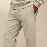 Man wearing Cotton Fleece Joggers in Wolf Grey, closeup.|wolf green