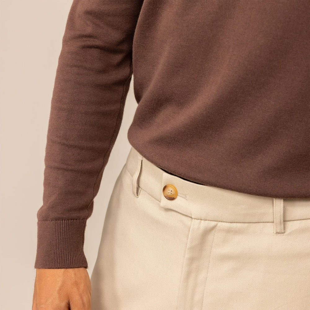 Man wearing a Marame Fine Knit Crew Neck Jumper in Conker Brown, closeup.