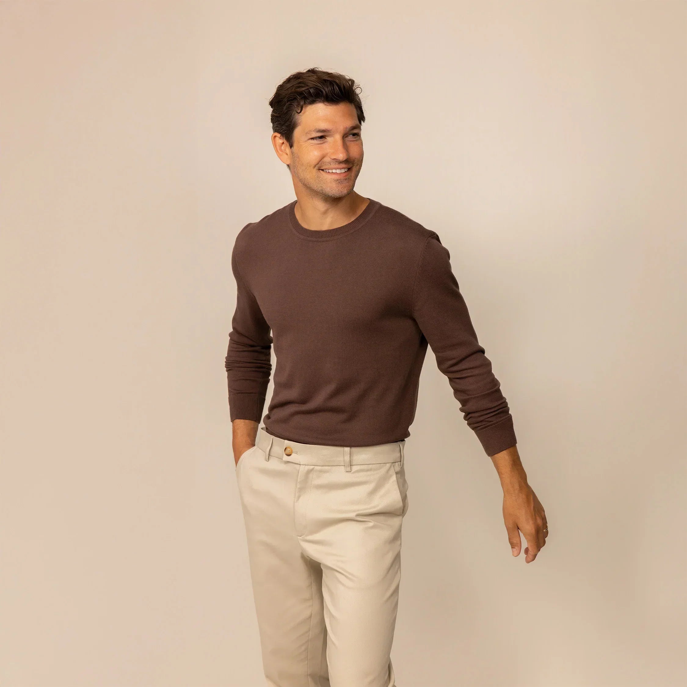 Man wearing a Fine Knit Crew Neck Jumper in Conker Brown, front view. |conker brown
