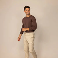Man wearing a Marame Fine Knit Crew Neck Jumper in Conker Brown, front view. |conker brown