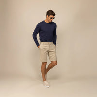 Man wearing a Marame Fine Knit Crew Neck Jumper in Navy, front view.