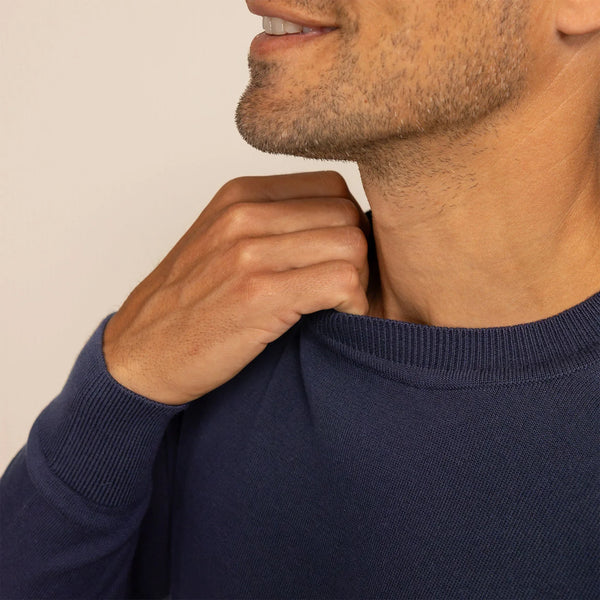 Man wearing a Fine Knit Crew Neck Jumper in Navy, closeup.