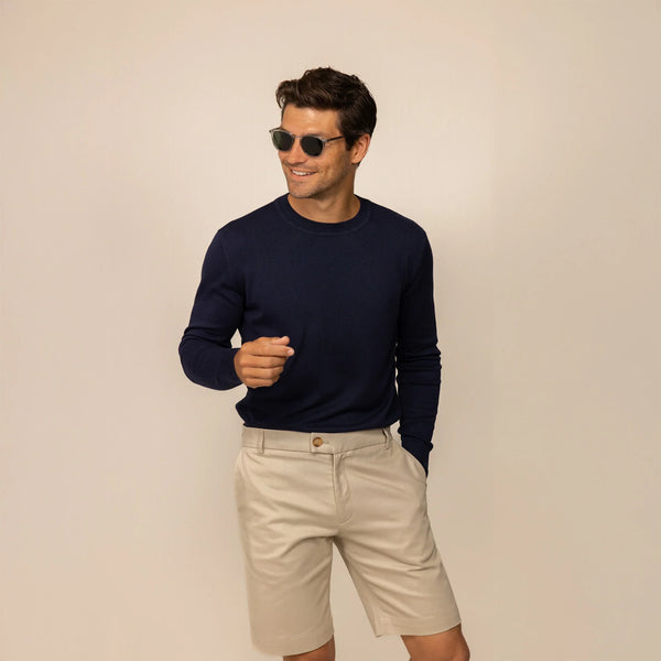 Man wearing a Marame Fine Knit Crew Neck Jumper in Navy, front view.