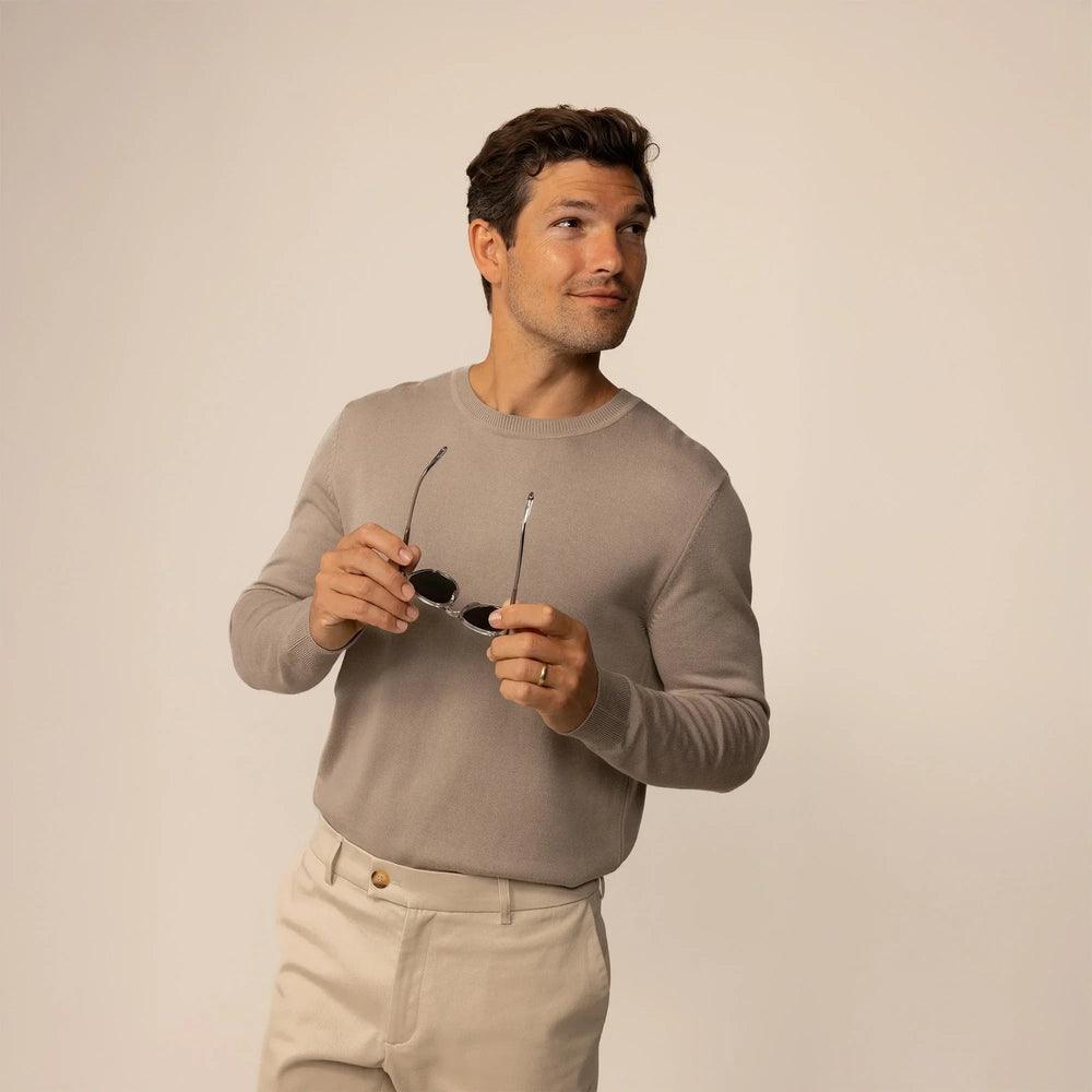 Man wearing a Marame Fine Knit Crew Neck Jumper in Putty Dove, front view. |putty dove