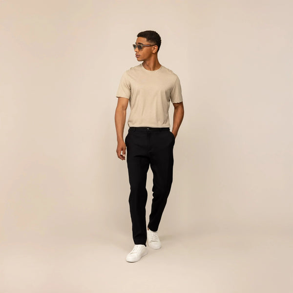 Man wearing Marame Casual Linen Blend Trousers in Black, front view. |black 