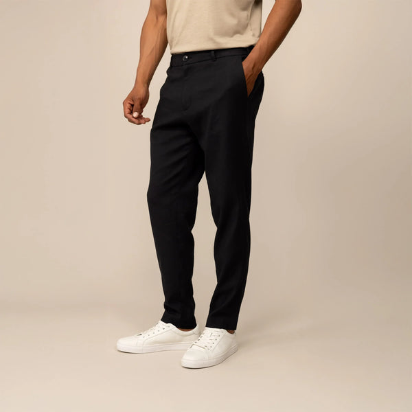 Man wearing Marame Casual Linen Blend Trousers in Black, front view.