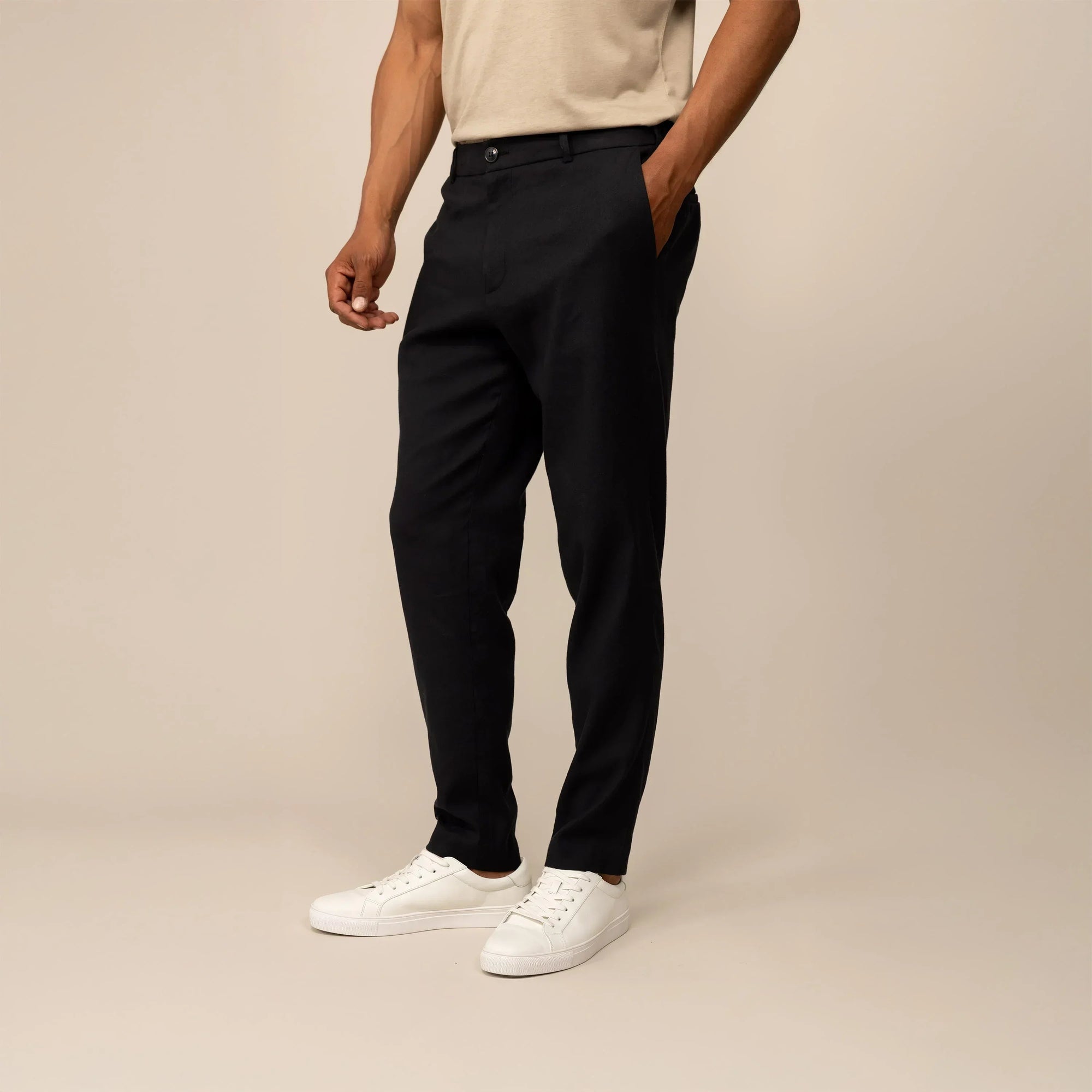 Man wearing Marame Casual Linen Blend Trousers in Black, front view. |black 