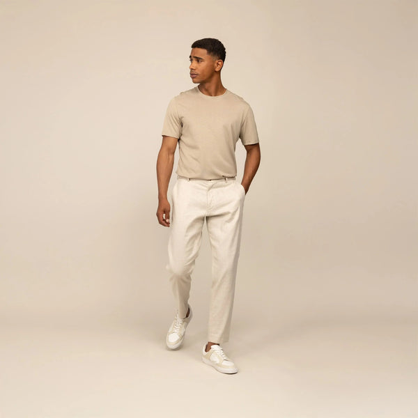 Man wearing Marame Casual Linen Blend Trousers in Woven Sand, front view. |woven sand