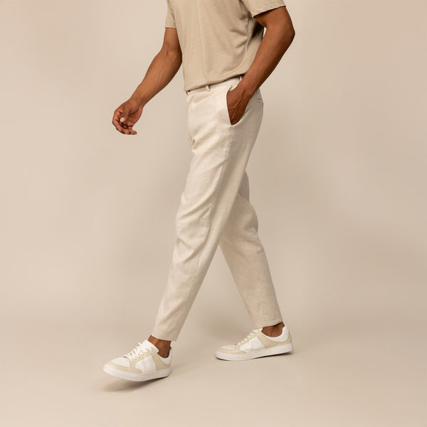 Man wearing Marame Casual Linen Blend Trousers in Wovern Sand, front view.