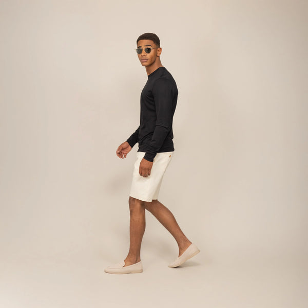 Man wearing a Marame Long Sleeve Logo T-Shirt in Black, front view.