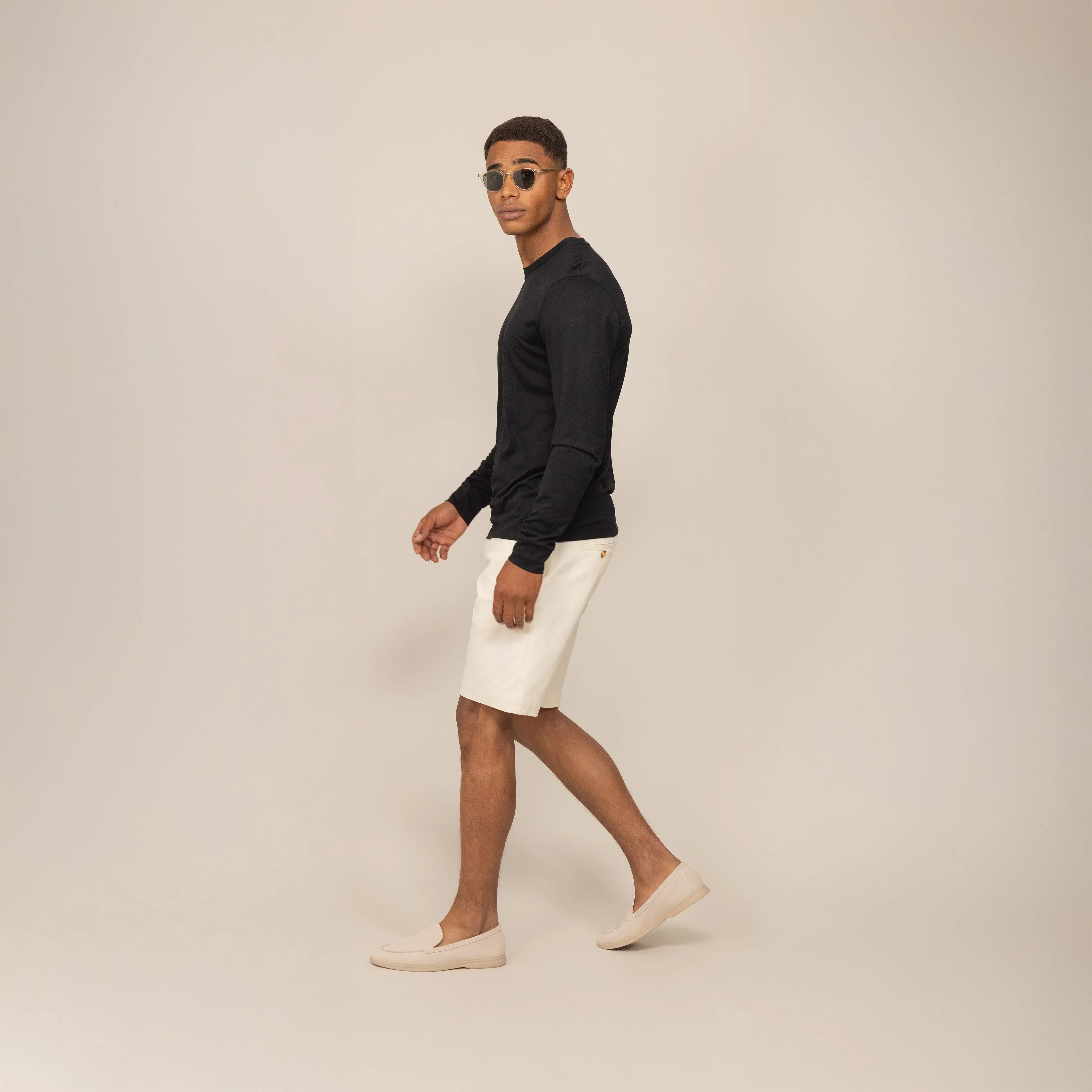 Man wearing a Marame Long Sleeve Logo T-Shirt in Black, front view. |black