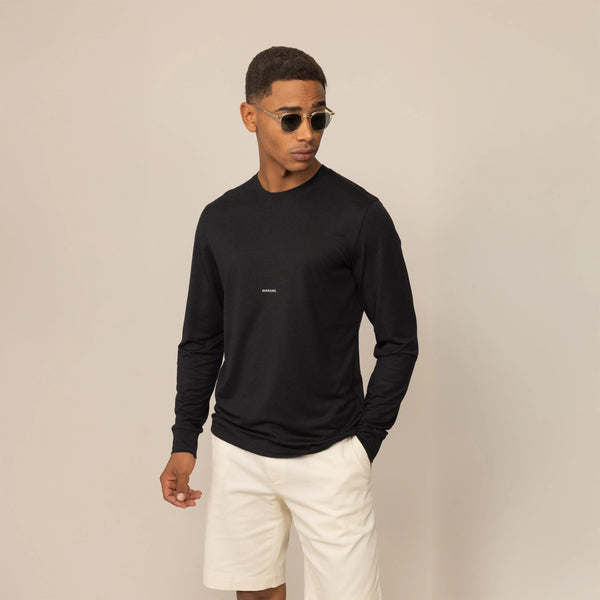 Man wearing a Marame Long Sleeve Logo T-Shirt in Black, front view. |black