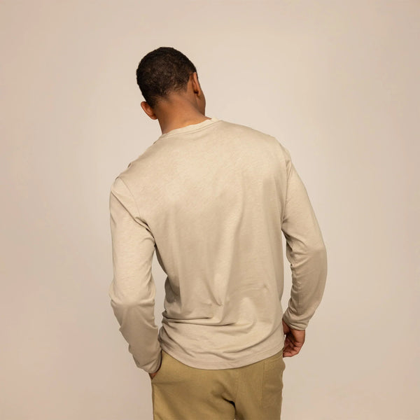 Man wearing a Long Sleeve Logo T-Shirt in Canyon Clay, rear view. |canyon clay