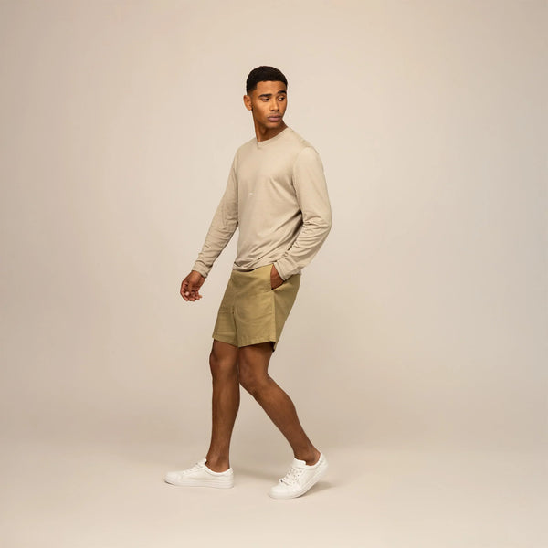 Man wearing a Marame Long Sleeve Logo T-Shirt in Canyon Clay, front view.