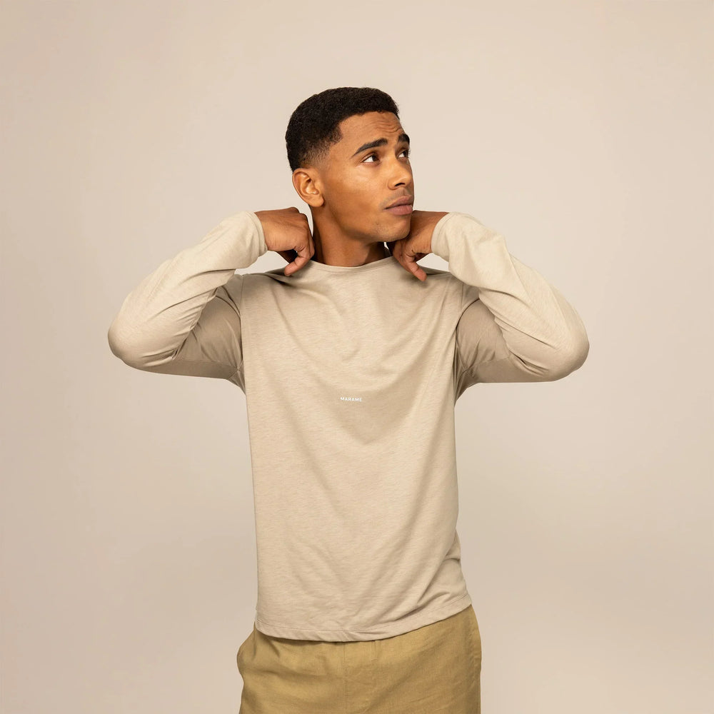 Man wearing a Marame Long Sleeve Logo T-Shirt in Canyon Clay, front view.