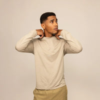 Man wearing a Marame Long Sleeve Logo T-Shirt in Canyon Clay, front view.
