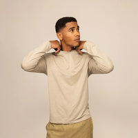 Man wearing a Marame Long Sleeve Logo T-Shirt in Canyon Clay, front view. |canyon clay