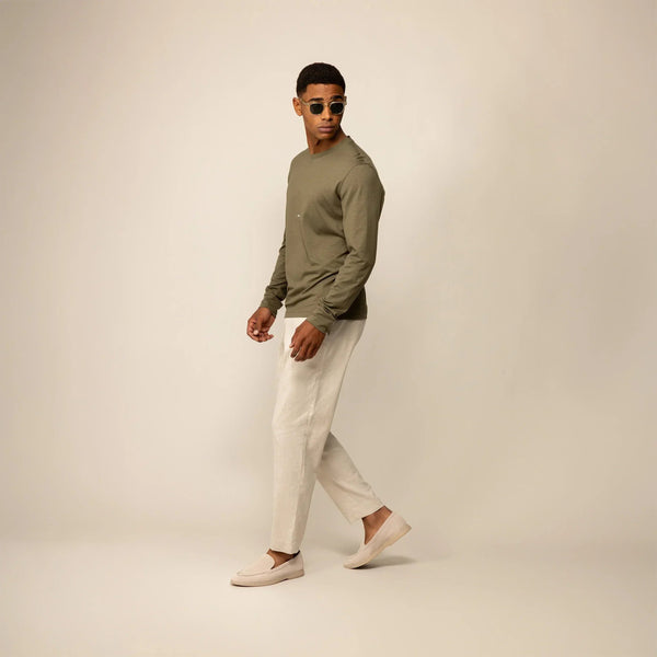 Man wearing a Marame Long Sleeve Logo T-Shirt in Olive, front view. |olive