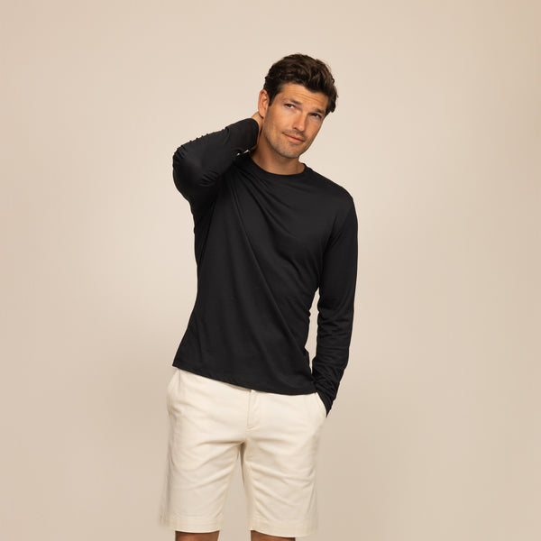Man wearing a Long Sleeve Lyocell Blend T-Shirt in Black, front view.