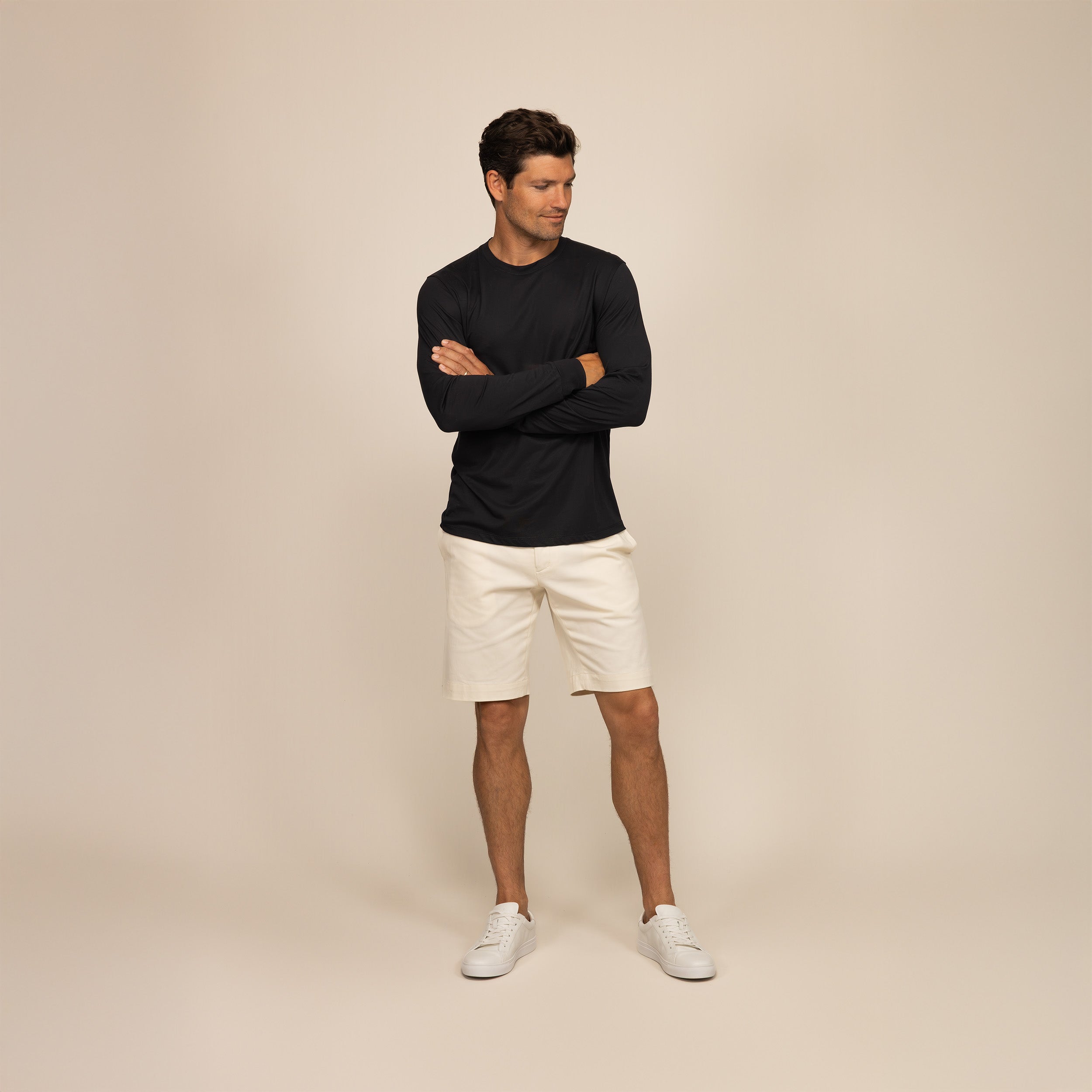 Man wearing a Marame Long Sleeve Lyocell Blend T-Shirt in Black, front view.