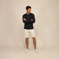 Man wearing a Marame Long Sleeve Lyocell Blend T-Shirt in Black, front view. |Black