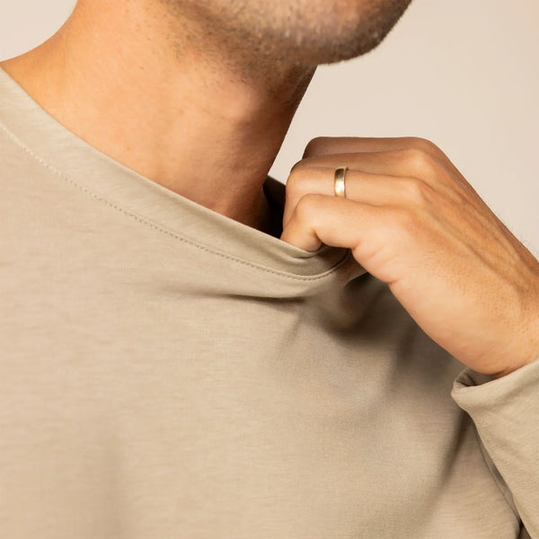 Man wearing a Long Sleeve Lyocell Blend T-Shirt in Canyon Clay, closeup.