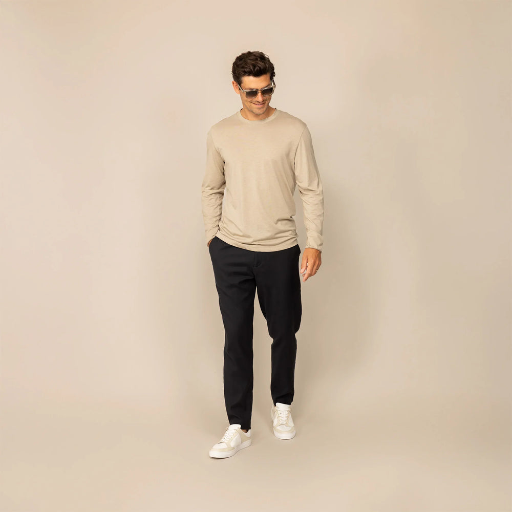 Man wearing a Marame Long Sleeve Lyocell Blend T-Shirt in Canyon Clay, front view.